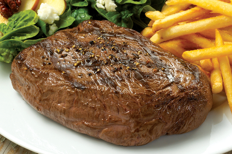 sirloin steak with fries and spinach salad