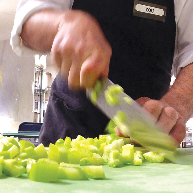 chef chopping celery