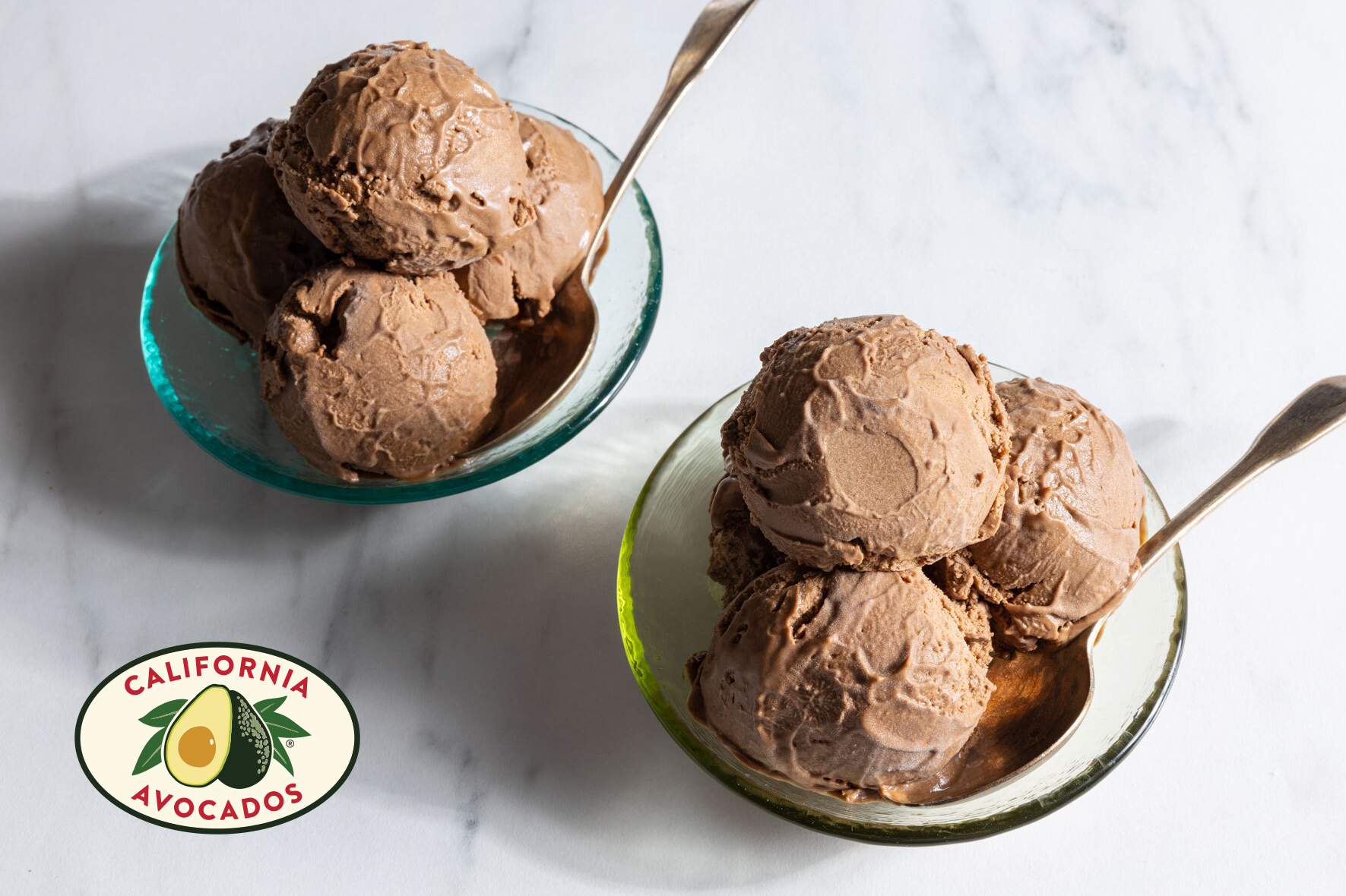two bowls of chocolate avocado ice cream with California avocados logo
