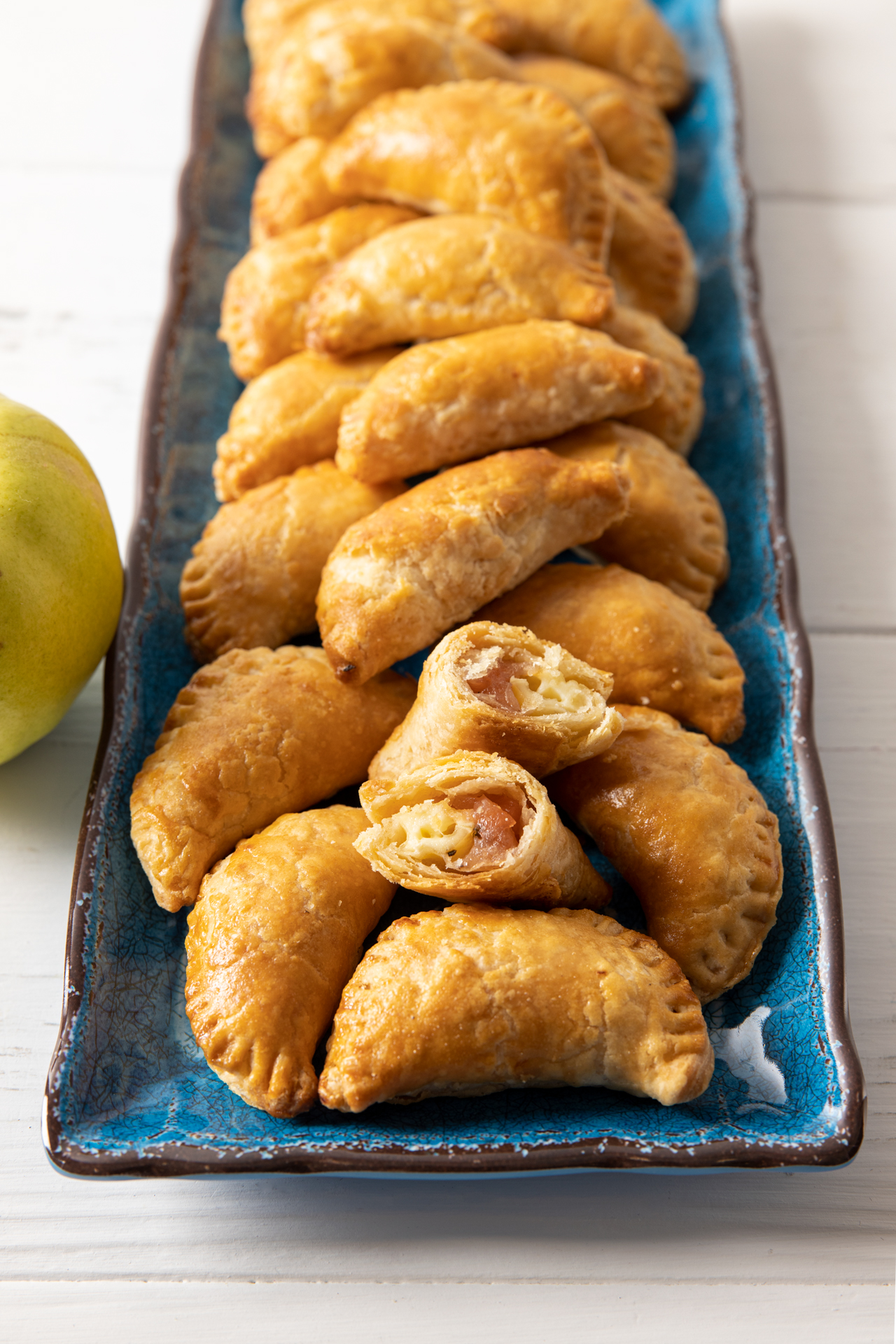 quince and brie empanadas with a quince fruit