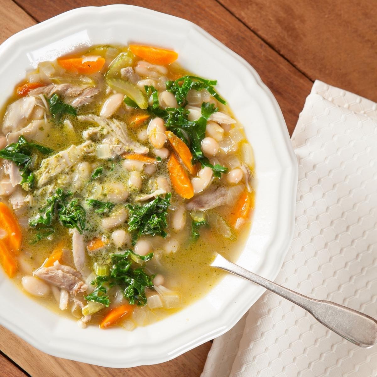 tuscan chicken and white bean soup in a bowl