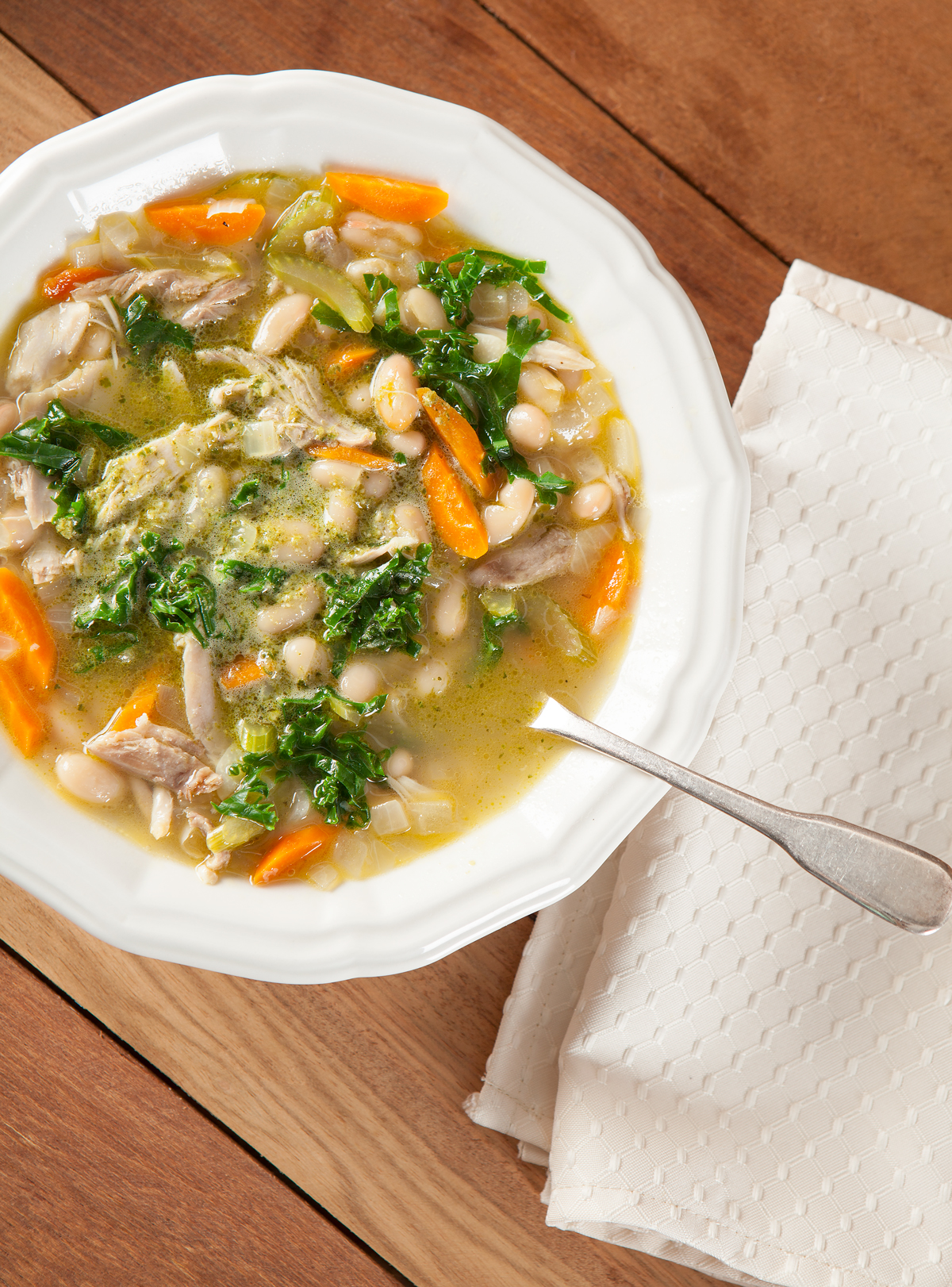 tuscan chicken and white bean soup in a bowl