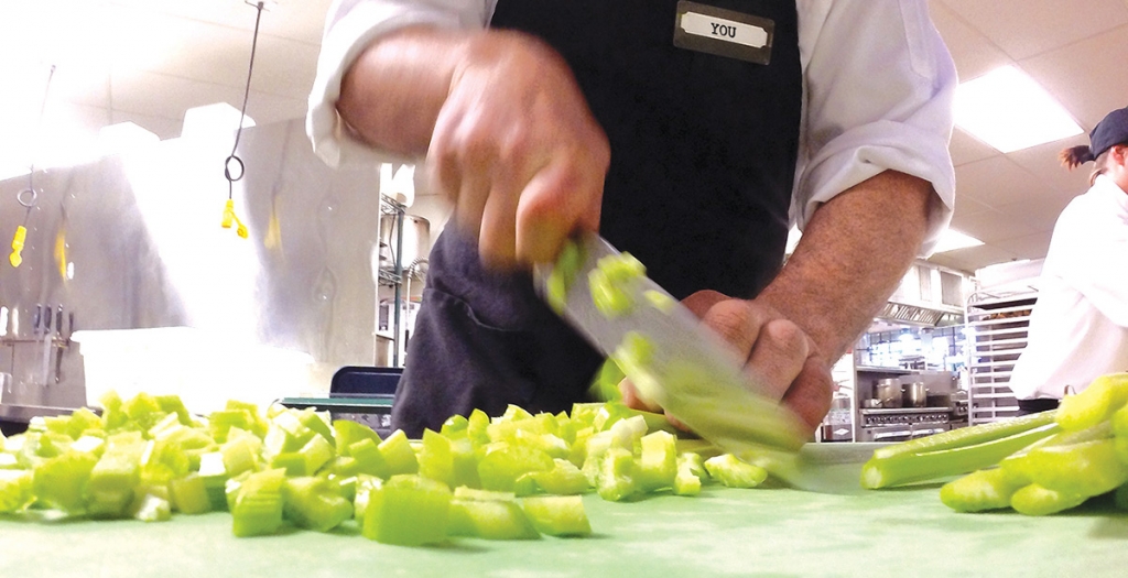 chef chopping celery